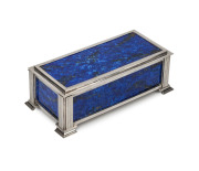 HARDY BROS. Sterling silver and lapis lazuli jewel casket by Hardy Bros. London, circa 1933, 7cm high, 21cm wide, 10.gcm deep