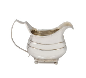 A Georgian sterling silver jug by Samuel Whitford I, London, circa 1793, 10cm high, 165 grams