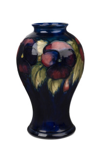 MOORCROFT "Pansy" pattern mantle vase, circa 1935, impressed signature and mark "Moorcroft, Potters H.M. The Queen, Made In England", ​24cm high