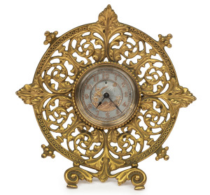 An ornate English table clock by the British United Clock Company of Birmingham, 19th century, 18cm high