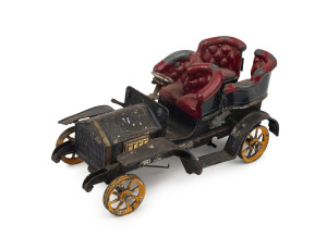 An Antique English tinplate clockwork toy car, early 20th century, 22cm long
