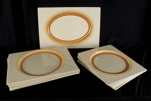 CLARICE CLIFF Nine Art Deco plates, circa 1930s, stamped "Bizarre by Clarice Cliff, The Biarritz, Royal Staffordshire, Great Britain, Regd. No.184849", ​the largest 30.5cm across
