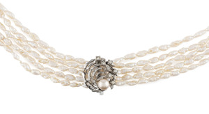 A freshwater pearl necklace, five strands of freshwater pearls adorned with a white gold and diamond set clasp, 72cm long