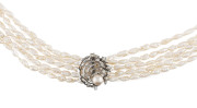A freshwater pearl necklace, five strands of freshwater pearls adorned with a white gold and diamond set clasp, ​72cm long