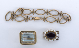 A 9ct gold bracelet 10.6 grams, an 18ct gold and aquamarine pendant set with diamonds; plus a 9ct gold and garnet clasp set with seed pearls, (3 items)