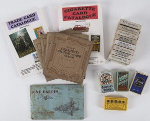 A collection of assorted cigarette and trade cards, vintage and antique cigarette boxes and packets and reference books