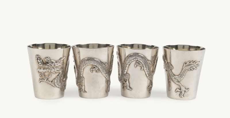 Set of four Chinese silver whisky beakers by C.J. Co. Shanghai, late 19th century,5.5cm high, 240 grams