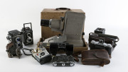 CAMERAS, MOVIE PROJECTORS and other photographic equipment. An accumulation in very mixed condition; noted two "gold" copy Leicas. (Qty.). - 2