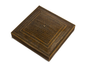 An inlaid Persian cigar box with red satin interior; a gift from the Shah of Iran, 5cm high, 25cm wide, 25cm deep