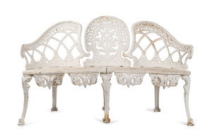 A cast iron garden bench with white painted finish, 20th century, 138cm across