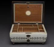 An Anglo-Indian vizagapatam ivory workbox of sarcophagus form, with gadrooned cover and bands of leaves, birds and figures, interior beautifully fitted with sandlewood and ivory compartments, early 19th century, ​19cm high, 31cm wide, 22cm deep - 2