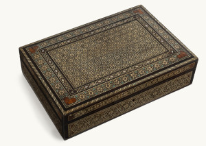 An inlaid Persian cigar box, the interior of the lid also decorated, mid 20th century, 8.5cm high, 34.5cm wide, 23cm deep