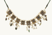 An antique Polki gold necklace, featuring seventy-nine uncut diamonds, pearls and other stones; circa 1900.&nbsp;&nbsp;