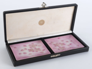 A pair of wireless cloisonné dishes (each 10 x 12cm) by ANDO, the makers of gifts for the Japanese Imperial family in cloisonné. In the box in which they were presented to staff at Government House, Perth, in appreciation, from the then crown prince (now emperor), at the conclusion of his visit in 1974.