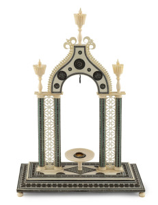 An Indian ivory watch stand, circa 1820s, in early wooden box endorsed in old ink on the lid "Mrs Hamsteed. Indian Watch Stand". 28cm tall.