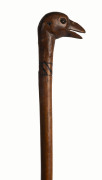 A fruitwood walking stick with carved birds head handle, 19th century, ​93cm high
