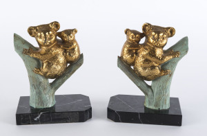 A pair of French Art Deco koala bookends, patinated spelter and marble, circa 1930s, ​16cm high