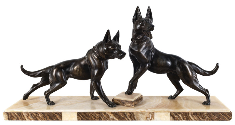 An Art Deco bronze finished spelter figure group of wolves on marble base. French, circa 1930, 44cm high, 90cm wide