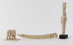 An African ivory Pharaoh statue, Indian ivory elephant statue and a letter opener, early 20th century, the Pharaoh statue 21cm overall