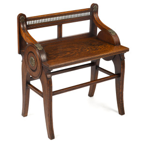 An English Arts & Crafts stool, oak and brass with diamond registration mark, retailed through Buckley & Nunn, Melbourne, 63cm high, 56cm wide, 34cm deep