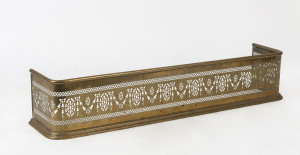 A Victorian fire curb, pierced brass, 19th century, 107cm wide, 25cm deep