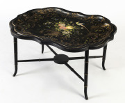 A Chinoiserie papier-mache and timber occasional table, 19th century, 45cm high, 84cm wide, 65cm deep