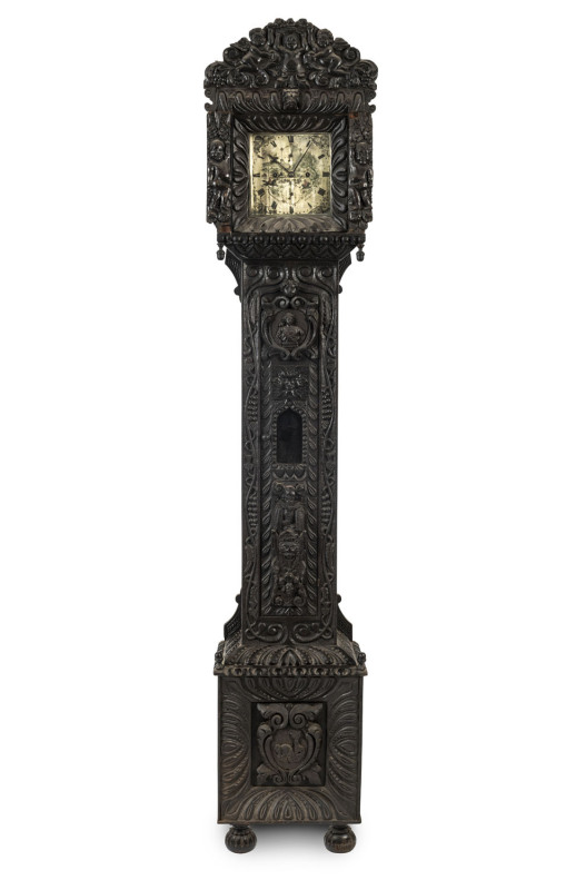 An English longcase grandfather clock by "T. Hammond, 16 Quay St, Manchester", ornately carved oak in the Elizabethan style, 18th/19th century, 220cm high