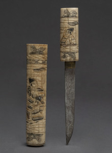 A Japanese dagger with carved bone handle and scabbard, early 20th century, 23cm long