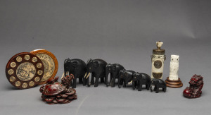 Six graduated ebony elephants, ivory owl statue, bone opium bottle, Chinese compass and pair of reproduction Chinese ornaments, 20th century, opium bottle 12cm high