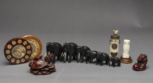 Six graduated ebony elephants, ivory owl statue, bone opium bottle, Chinese compass and pair of reproduction Chinese ornaments, 20th century, ​opium bottle 12cm high