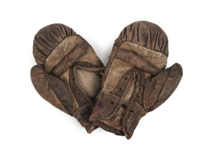 A pair of antique boxing gloves in childrens size, late 19th/early 20th century, ​15cm high