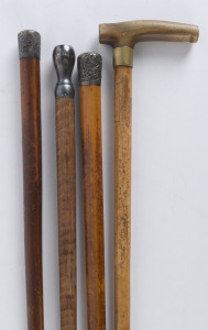 Four antique walking sticks with horn and silver handles, 19th/20th century,tallest 96cm 