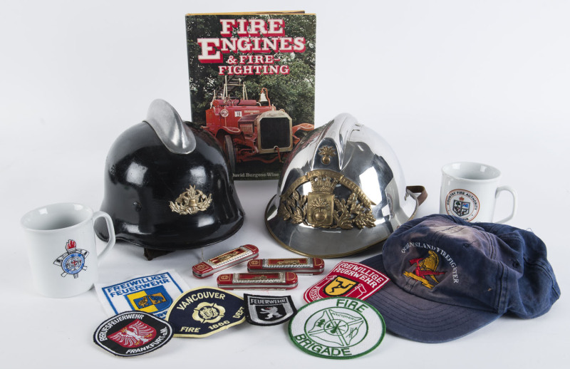 An antique fireman's helmet and a collection of brigade memorabillia