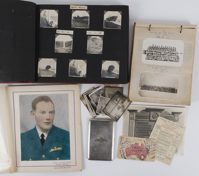 R.A.F. Sterling silver cigarette case, portrait photograph of Squadron Leader J.E. Scott D.F.C., WW2 photo albums with captions plus a memorial photograph of honour roll, circa 1943