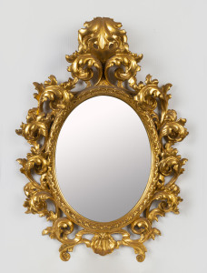 A Rococo style gilt framed oval mirror, 20th century, ​67cm x 49cm