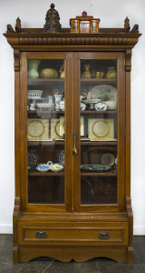 An American oak two door bookcase, late 19th century, ​215cm high, 115cm wide, 38cm deep