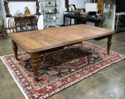 An English mahogany extension dining table with two leaves, circa 1880, 76cm high, 265cm wide (extended), 143cm deep