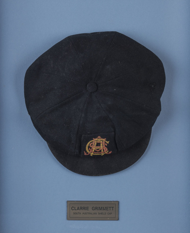 CLARENCE VICTOR "CLARRIE" GRIMMETT'S SOUTH AUSTRALIAN CRICKET CAP, 1924, with the SACA emblem embroidered to front. Fine condition and attractively framed.