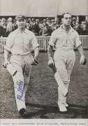 JACK HOBBS, pen signature on a photgraph of him walking out to bat with Herbert Sutcliffe at Birmingham in 1924. Framed & glazed; overall 35 x 29cm. - 2