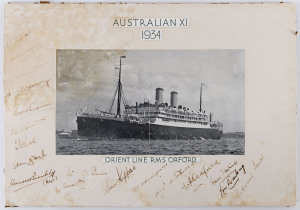 A mounted display titled "AUSTRALIA XI 1934" and showing the Orient Line R.M.S.Orford, which carried the Australian Team to England. The complete touring party of 18 has signed (in pen) to the mount but most of the autographs are damp affected.