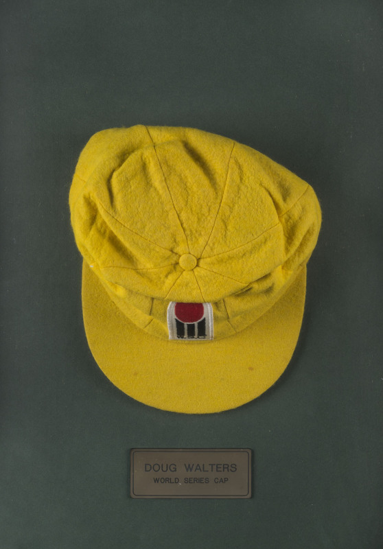 DOUG WALTER'S WORLD SERIES CRICKET CAP, 1978, yellow wool with the "W.S.C." logo to front. Attractively framed. Accompanied by a Statutory Declaration advising that the cap was acquired from a Knight's Sporting Memorabilia auction in the 1980s.