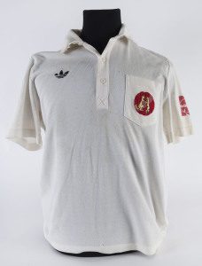 KIM HUGHES, short-sleeved team shirt from the Australian Team he captained to the unofficial Rebel Tour of South Africa 1985-86. Provenance: The Kevin O'Dowd Collection.
