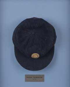 HASHAN TILLAKARATNE'S SRI LANKA TEST CAP, dark blue wool with the Sri Lankan lion emblem embroidered to front; Albion label and signed by Tillakaratne inside. Attractively framed.