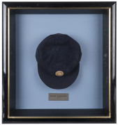 HASHAN TILLAKARATNE'S SRI LANKA TEST CAP, dark blue wool with the Sri Lankan lion emblem embroidered to front; Albion label and signed by Tillakaratne inside. Attractively framed. - 2