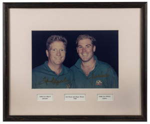 SHANE WARNE & IAN HEALY signed photograph which commemorates Warne's 300th Test Wicket at Sydney in January 1998 and Ian Healy's 100th Test Match, which had been at Adelaide. Framed & glazed, overall 39 x 47cm.Shane Warne became the 13th bowler to claim 300 Test wickets when he bowled Australia to an innings victory over South Africa in the second Test at the Sydney Cricket Ground in January 1998. He took 11 for 109 during the match. Healy's signature will always be his work standing over
