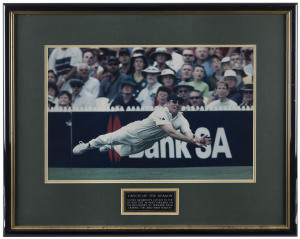 GLENN McGRATH: Two original photographic displays, individually framed and glazed; the first depicts McGrath in full flight taking the "catch of the season" in the 2nd Test against England at Adelaide 2002-03; the second, shows McGrath's 500th Test Wicket taken at Lords in July 2005 the image signed by McGrath and Justin Langer, who took the catch. (2 items) 51 x 63cm and 82 x 43.5cm.