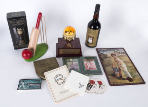 A cricket miscellany including Bradford Exchange plates for Victor Trumper, Greg Chappell, Bill O'Reilly & Don Bradman, a mounted ball signed by Adam Gilchrist & Tony Dodemaide, Jan.1997 at the WACA, a replica Ashes Urn in a presentation box, a bat & ball