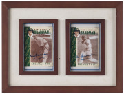 Don Bradman: 1997 Sanitarium (Weet-Bix) 'Sir Donald Bradman AC Greatest Hits', 2 cards from set of 16, both cards signed by Don Bradman. (2). Presented together in a small farme, overall 20.5 x 26.5cm.