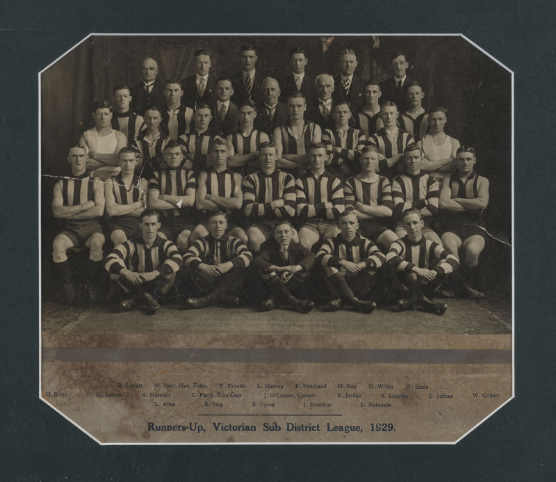 Original photograph mounted and titled below "Runners-Up, Victorian Sub District League, 1929"; framed & glazed, overall 44 x 48cm.The yound team features several players who went on to careers with VFL teams: Fred Froude (Collingwood and then St.Kilda co