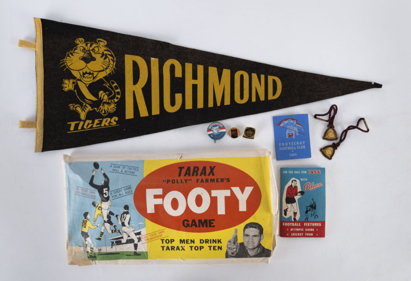 An accumulation including the rare "Tarax Polly Farmer's Footy Game" issued in 1964 (7/6 plus 6 bottle tops!), 1956 Pelaco Football Fixture, 1964 Footscray Patron's Membership card, 1964 C.U.B. Football Fixture, 1969 Richmond felt banner, several badges (